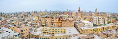 Panoramic view on historical Islamic neighborhood with residential houses and medieval mosques and mausoleums, Cairo, Egypt clipart