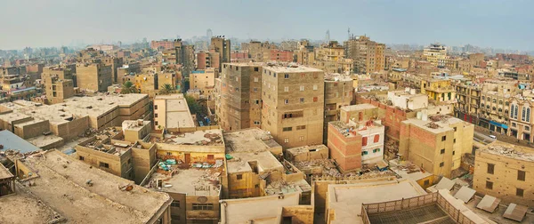 Panorama with poor residential earthen brick buildings of Islamic Cairo district, Egypt.