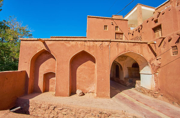 Exterior of the ancient Harpak Fire Temple, located in historic red adobe village of Abyaneh, Iran.