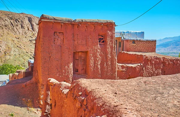 The red mud buildings are visit card of ancient traditional Iranian village of Abyaneh, hidden in Karkas Mountains.