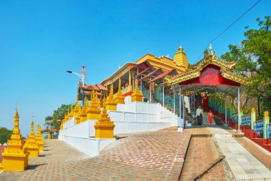 SAGAING, MYANMAR - FEBRUARY 21, 2018: The ascent on Sagaing Hill with shrines of U Min Thonze Caves - the important Buddhist site, on February 21 in Sagaing