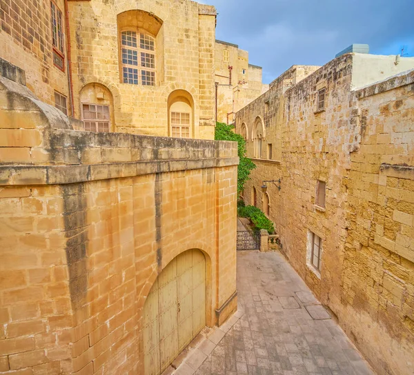 The old architectural complex with strong stone buildings of medieval Mdina citadel in Malta