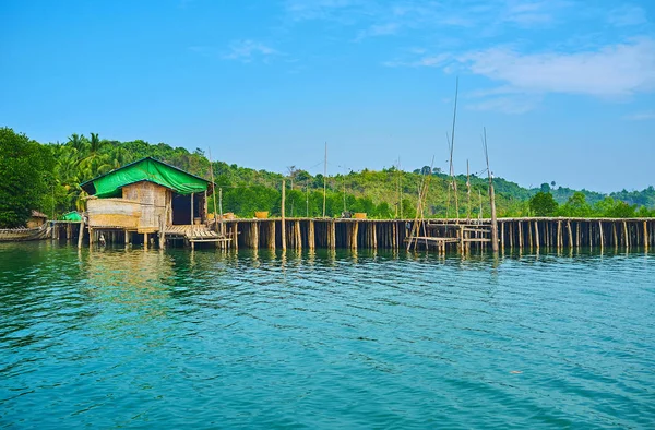 stock image Drying is the most popular method of fish preservation in Myanmar, so the presevation farms on rivers has raised platforms on stilts, like this one in Chaung Tha.