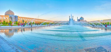 ISFAHAN, IRAN - OCTOBER 19, 2017: Nashq-e Jahad Suare is the main tourist place in the city with amazing landmarks around the large walking area, on October 19 in Isfahan