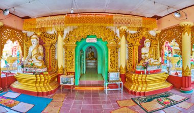 Bago, Myanmar - 15 Şubat 2018: Panorama hanesinin çarpıcı görüntü Shwe Gu yatıyordu Pagoda Buda heykelleri, sütun, 15 Şubat Bago karmaşık oyma ve yaldızlı süslemeler ile.