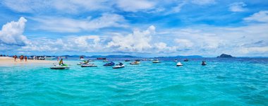 Panorama with rocking watercrafts, Khai Nai island, Phuket, Thai clipart