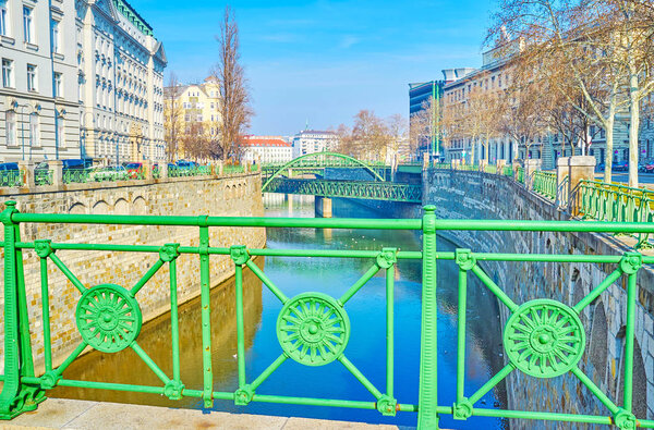 The Wein River boasts numerous metal green bridges, connecting Landstrasse and Innere Stadt districts, Vienna, Austria