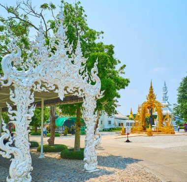 In garden of Wat Rong Khun Temple, Chiang Rai, Thailand clipart