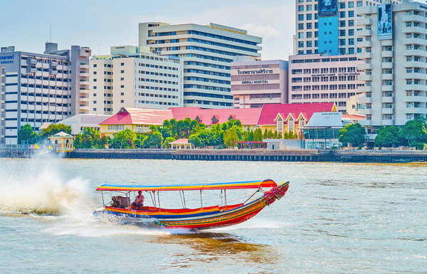 The small longtail boat on Chao Phraya river, Bangkok, Thailand