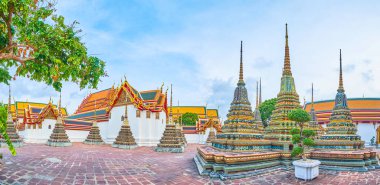 Panorama of chedis of Wat Pho temple in Bangkok, Thailand clipart
