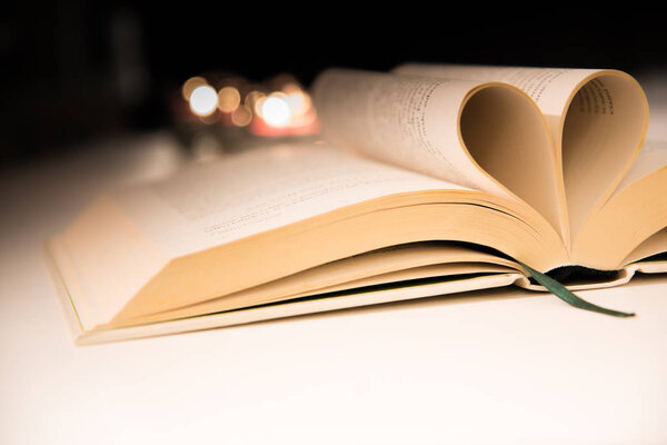 Book pages folded into heart