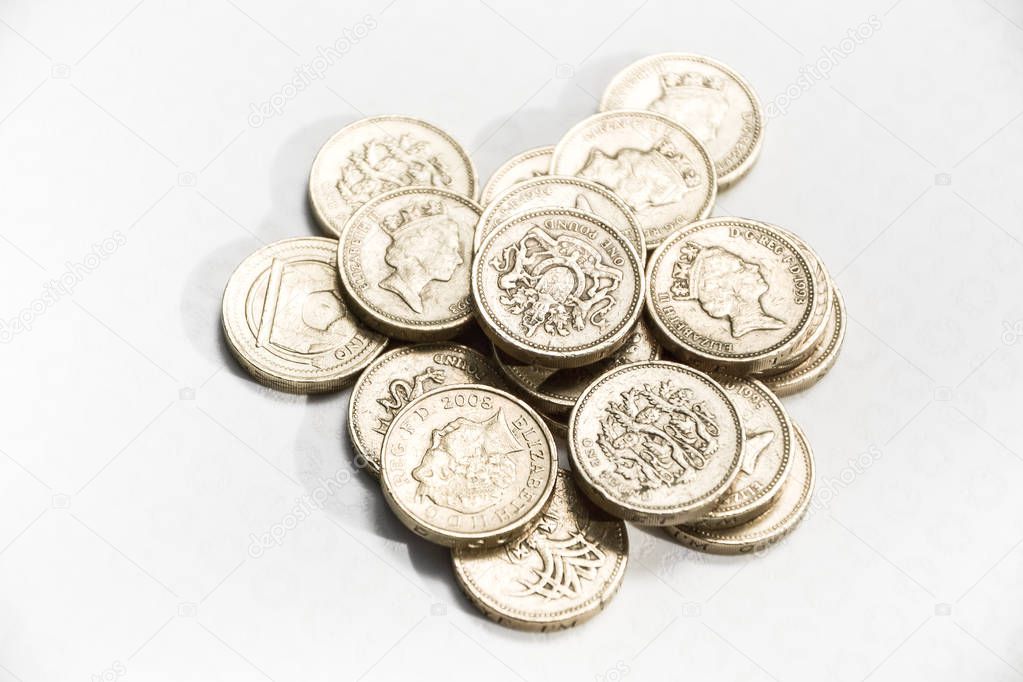 British one pound sterling coin isolated on white background - Brexit currency UK economy