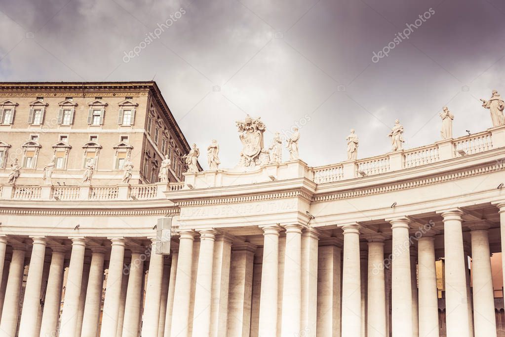 Rome, Italy, December 2018: Statues. Famous colonnade of St. Peter's Basilica in Vatican, Rome, Italy