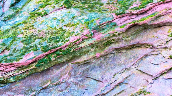 Colourful sedimentary rocks formed by the accumulation of sedime