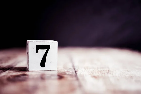 Number 7 isolated on dark background- 3D number seven isolated o — Stock Photo, Image