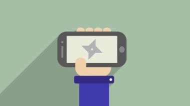 El Shuriken Ninja ile bir telefon tutarak