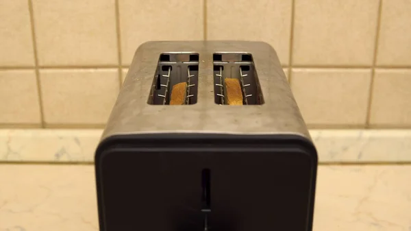 Toaster for making fried bread for breakfast. Electrical appliance in the kitchen — Stock Photo, Image