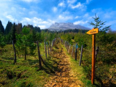 signpost towards Gorbeia Mountain peak clipart