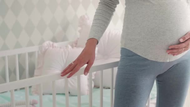 Unrecognizable Pregnant Woman Baby Room — Stock Video