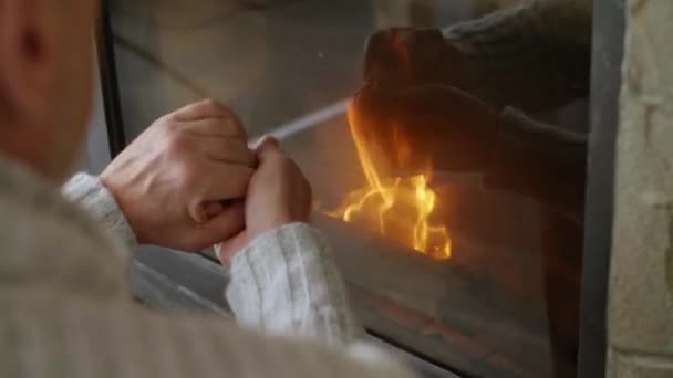 Man Warming Himself Fireplace — Stock Video