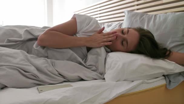 Displeased Woman Waking Bed Using Mobile Phone — Stock Video
