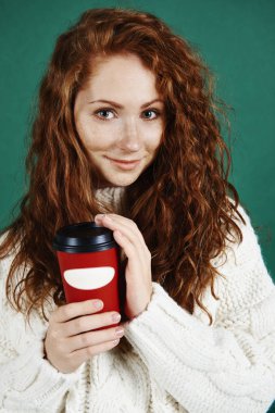 Beautiful woman holding disposable mug of coffee  clipart
