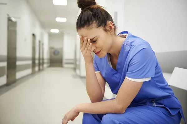 Female Nurse Suffering Headache — Stock Photo, Image