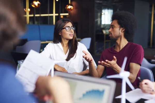 Woman Listening Attentively Coworkers Speech Office Meeting — ストック写真