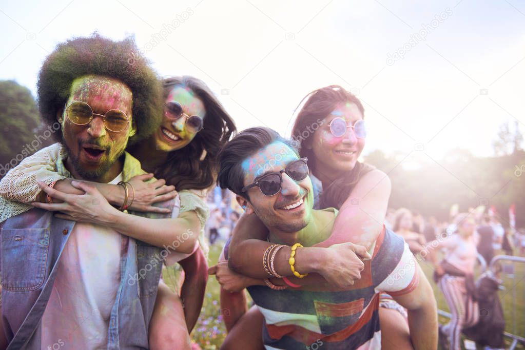 Portrait of group of friends at the festival  
