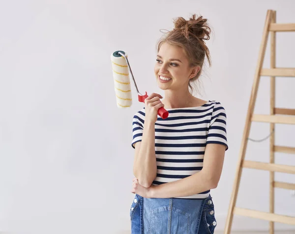 Young Woman Holding Paint Roller — Stock Photo, Image