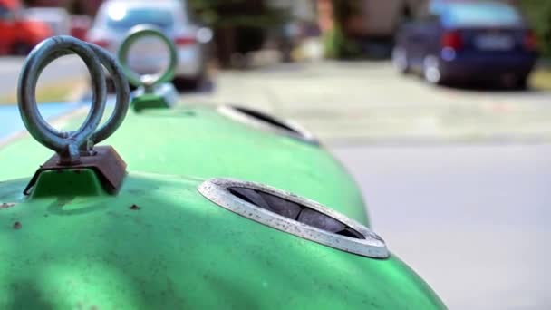 Man Throwing Away Empty Glass Bottle Recycling Bin — Stock Video