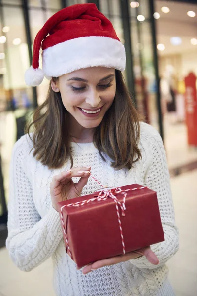 Curious Women Opening Christmas Present — Stock Photo, Image