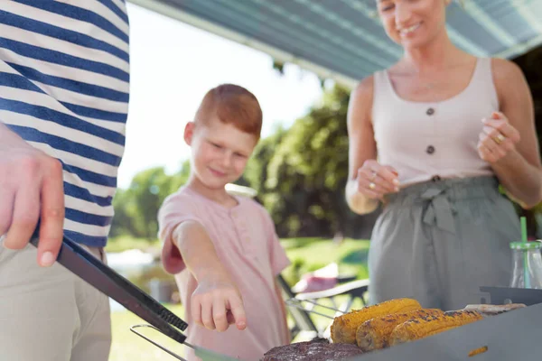 Boy Choosing Dish Barbecue Grill — Stock Photo, Image