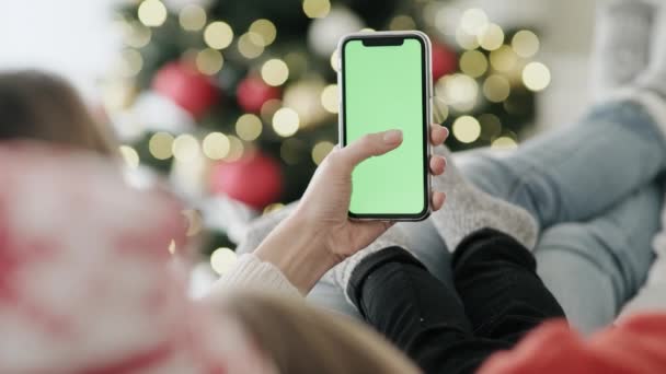 Cep Telefonunun Ayrıntıları Noel Zamanı Tarandı Kırmızı Helyum Kamerayla Çekildi — Stok video