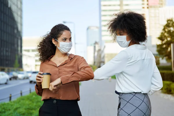 Two Business Women Greeting Street Elbow Touch — Stock Photo, Image