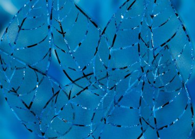 Farklı boyutlarda yaprakları olan renkli bir yaprak. Döşeme sanatı.