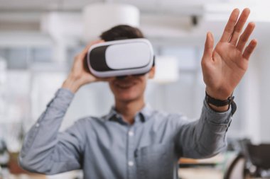 Young Asian businessman working at the office