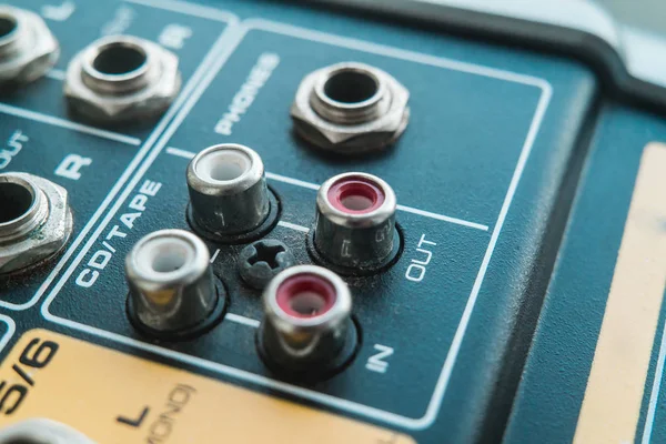 Photo of the analog audio mixer of the sound producer close up