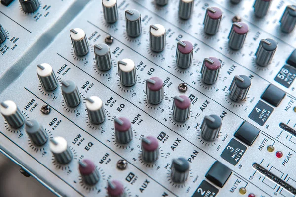 Photo of the analog mixer of the sound producer close up