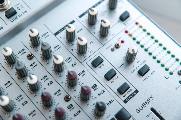 Photo of the analog mixer of the sound producer close up