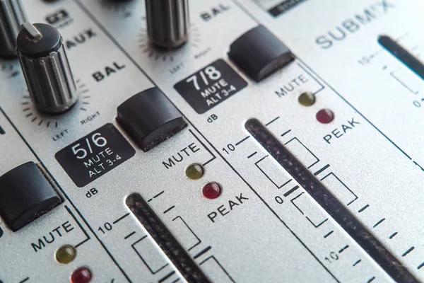 Photo of the analog mixer of the sound producer close up