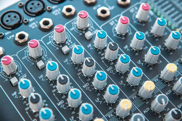 Photo of the analog mixer of the sound producer close up