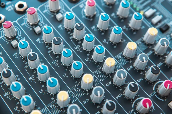 Photo of the analog mixer of the sound producer close up