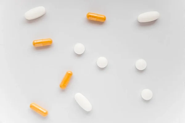 The photo of several tablets on a white background — Stock Photo, Image