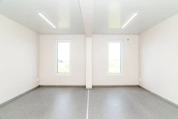 Light white empty office room with bright lighting