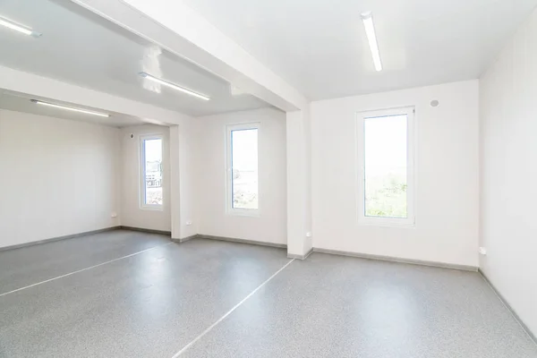 Light white empty office room with bright lighting