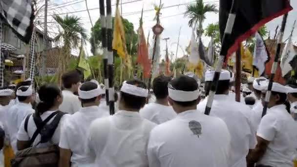 stock video Desa Munggu, Kabupaten Badung, Bali, Indonesia - February 29, 2020: Ceremony Mekotek is a heritage that has been professed by Hindus in Bali for centuries. A rite with long sticks held by men.