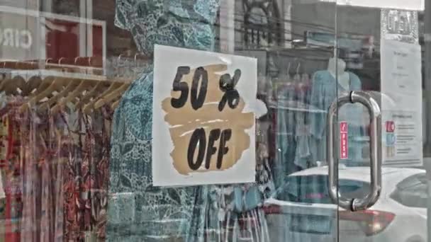 Red Sign Hanging Glass Window Inscription Sale — Stock Video