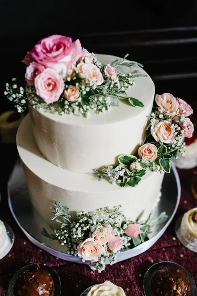 Sweet table with assorti of sweets on wedding holiday