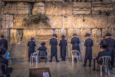 Jerusalem - October 03, 2018: Jews praying in the Western Wall i clipart